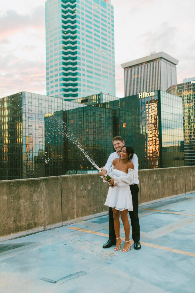 engagement photos with champagne